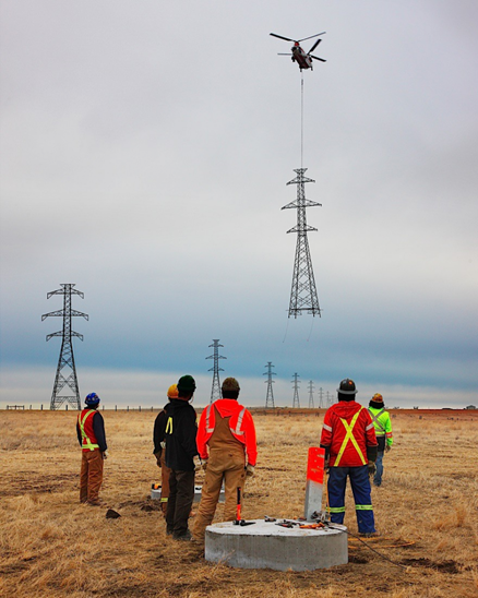 helicopter flies in a power tower